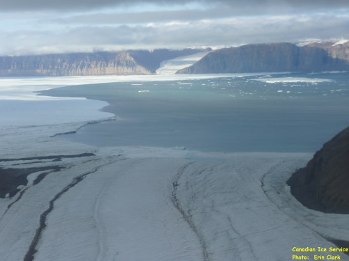Seaward front of Petermann Glacier Aug.-11, 2012. View is from a small side-glacier towards the south-east across Petermann Fjord with Petermann Gletscher to the left (east). [Photo Credit: Erin Clarke, Canadian Coast Guard Ship Henry Larsen] 