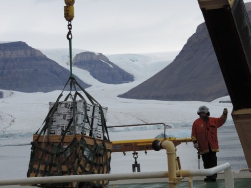 Photo of helicopter deck with Belgrave (left) and Petermann (right) Glaciers in back Aug.-23, 2015; view is to the north-east.