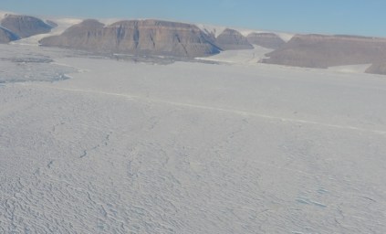 Terminus of Petermann Gletscher with Hubert (right), Belgrave (center), and Un-Named (left) Glaciers coming in from Hall Land in the north. The ocean is to the left (west).
