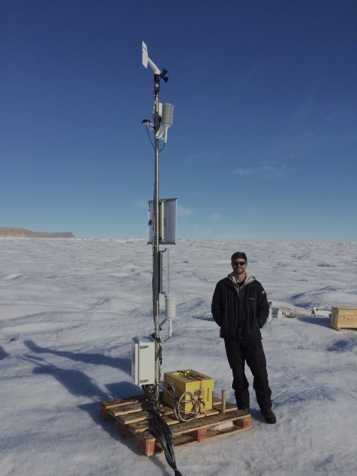 University of Delaware PhD student Peter Washam at the Ocean-Weather station on Petermann Gletscher after final installation 2015-Aug.-20, 17:00 UTC at 80 39.9697 N and 60 29.7135 W.