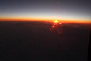 Sun over the horizon of Greenland as seen during NASA's Operation IceBridge Flight in October 2015.
