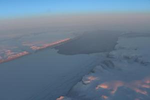 Petermann Gletscher at dawn on 5 Oct. 2015 as captured by NASA Operation IceBridge. Our Ocean Weather Station is in the corner bottom left.