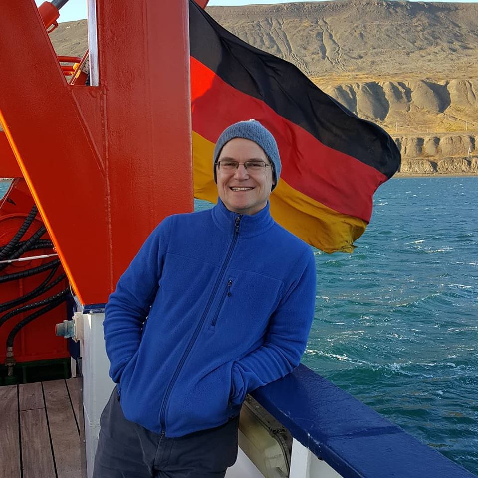 Author aboard German research vessel F/S Maria S. Merian in port of Longyearbyen, Svalbard in the fall of 2018. [Photo by Dragonfly Leathrum.]