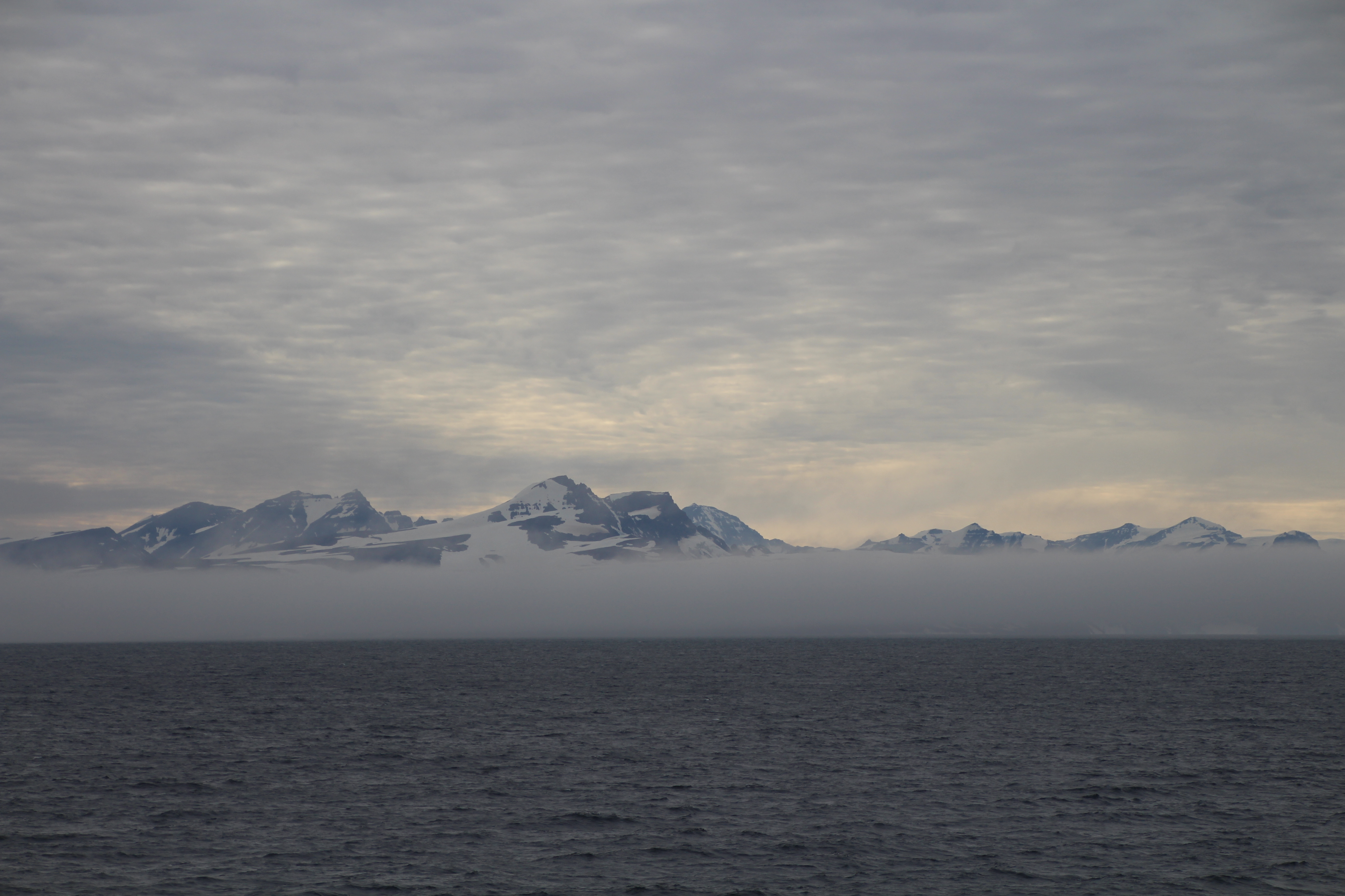 Marine layer at the entrance of Scoresby Sund on Aug.-20, 2018. Photo by Dragonfly Leathrum]