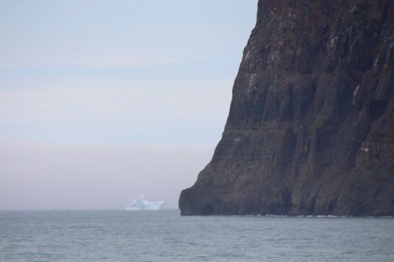 Kap Brewster at the southern entrance of Scoresby Sund on Aug.-20, 2018. View is to the south-east out to the open foggy sea. [Photo by Dragonfy Leathrum]